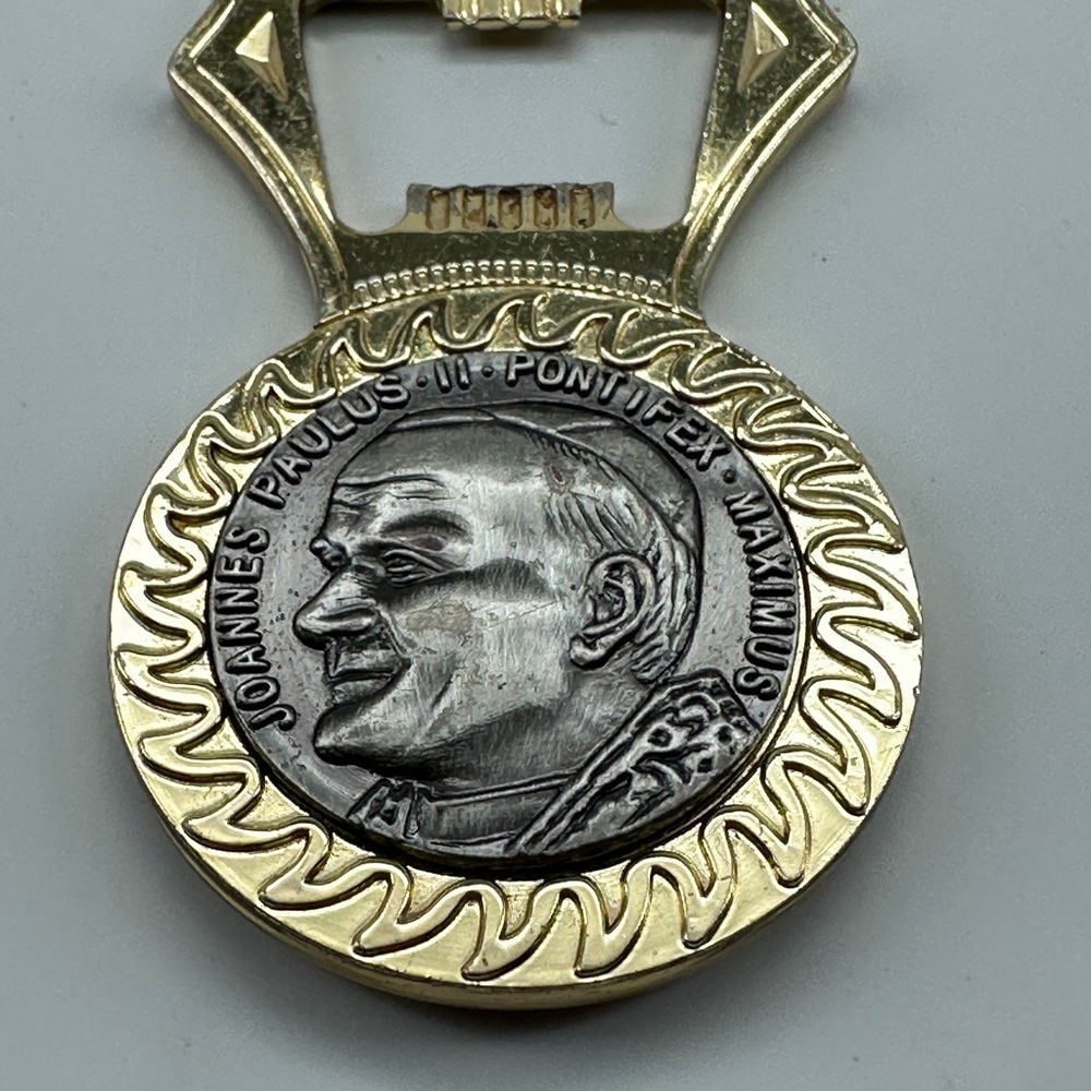 Pope beer opener